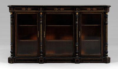 Appraisal: French bookcase cabinet ebonized and line inlaid case set with