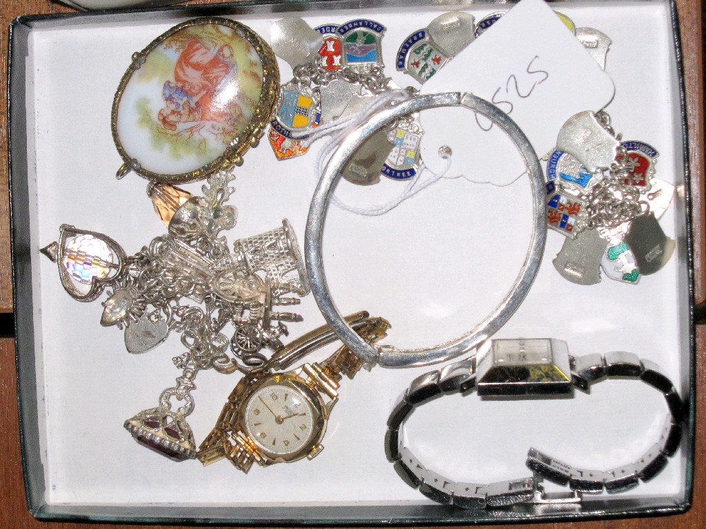 Appraisal: Lot comprising silver charm bracelets watches etc