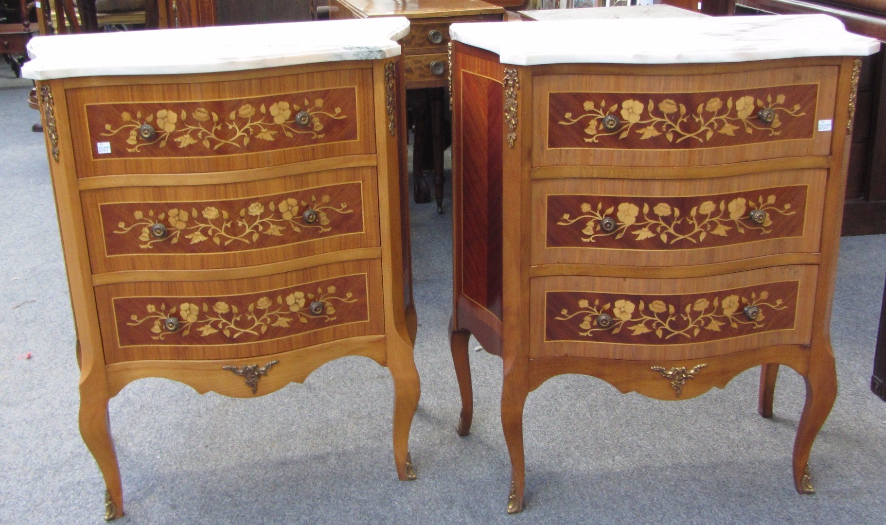 Appraisal: A pair of th century style Italian marquetry inlaid kingwood