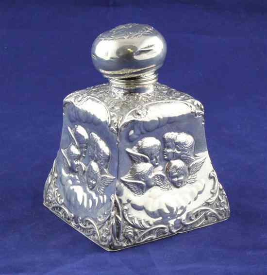 Appraisal: An Edwardian repousse silver mounted bell shaped glass scent bottle