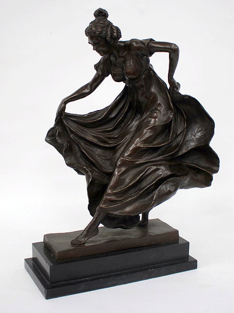 Appraisal: A CONTEMPORARY BRONZE SCULPTURE OF A GIRL rushing forward wearing