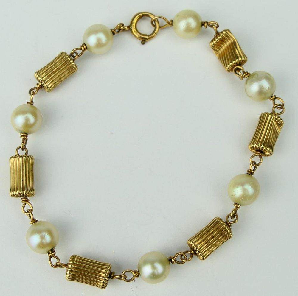 Appraisal: LADIES KT Y GOLD AND PEARL BRACELET Measures long with