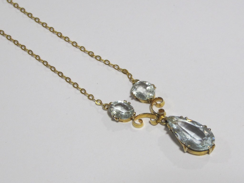 Appraisal: An Edwardian yellow metal blue topaz set pendant necklace with