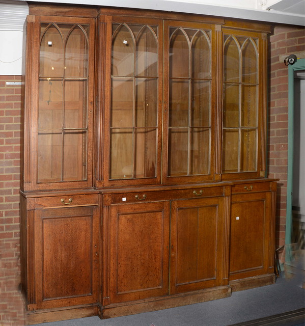 Appraisal: A VICTORIAN OAK BREAK FRONT BOOKCASE CONSTRUCTED IN FIVE SECTIONS