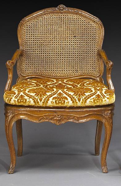 Appraisal: A Louis XV walnut fauteuil Henri Amand mid th century