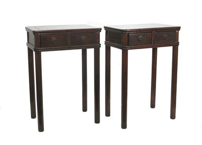 Appraisal: A pair of Chinese hardwood side tables with rectangular tops