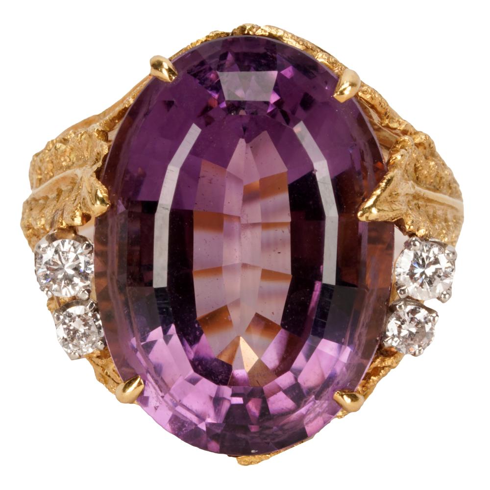 Appraisal: KARAT YELLOW GOLD DIAMOND AMETHYST RINGcentering one oval amethyst weighing