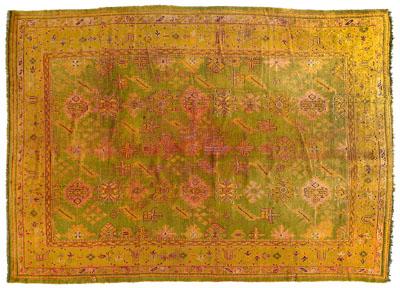 Appraisal: Oushak rug repeating motifs on pale green ground late th