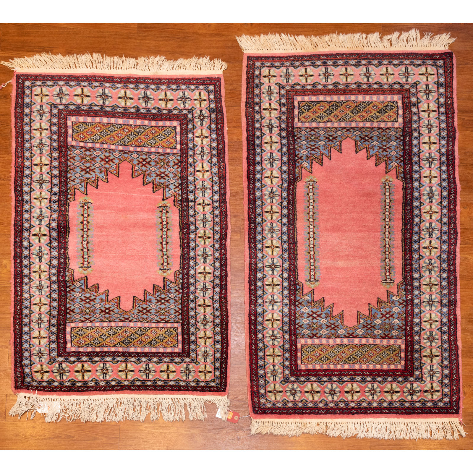 Appraisal: A PAIR OF BOHKARA RUGS PAKISTAN Rugs measure x x