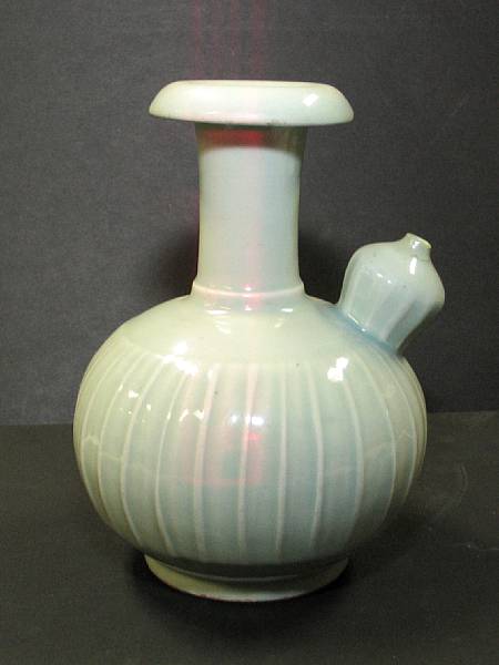 Appraisal: A celadon glazed porcelain melon-form kendi Edo Period Made for