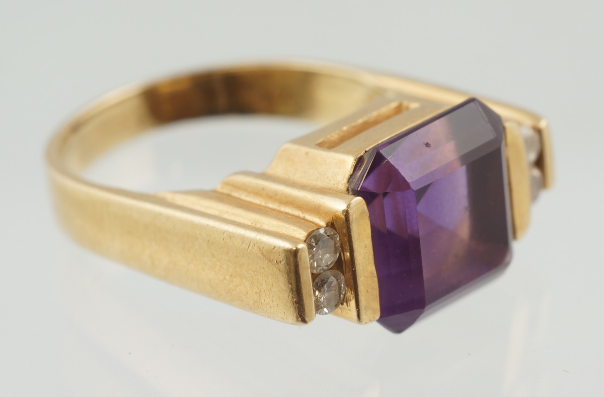 Appraisal: K YG amethyst and diamond retro style ring