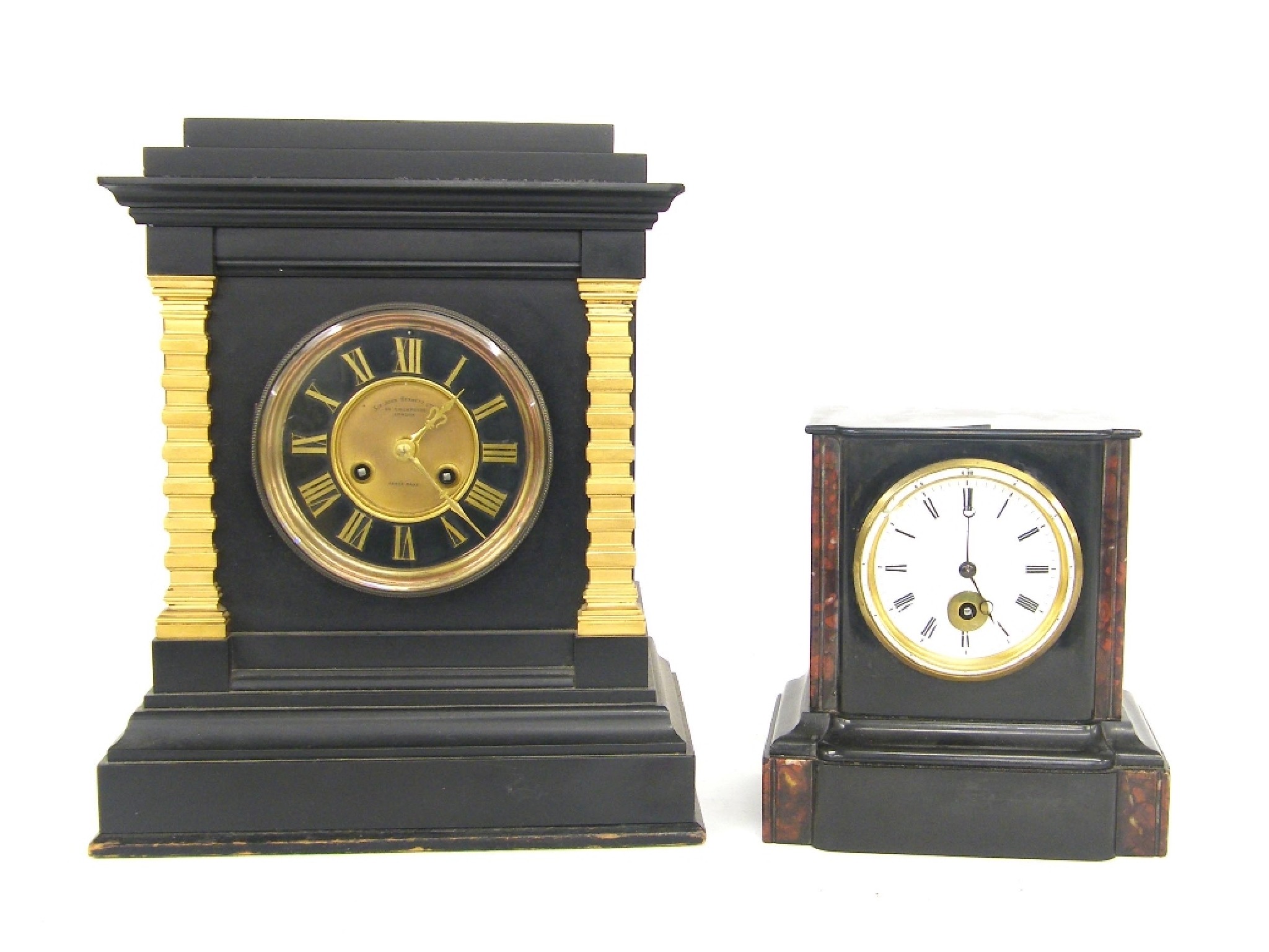 Appraisal: Large black slate two train mantel clock striking on a