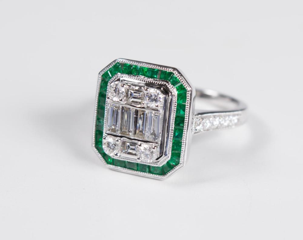 Appraisal: DIAMOND EMERALD AND EIGHTEEN KARAT WHITE GOLD RING The art