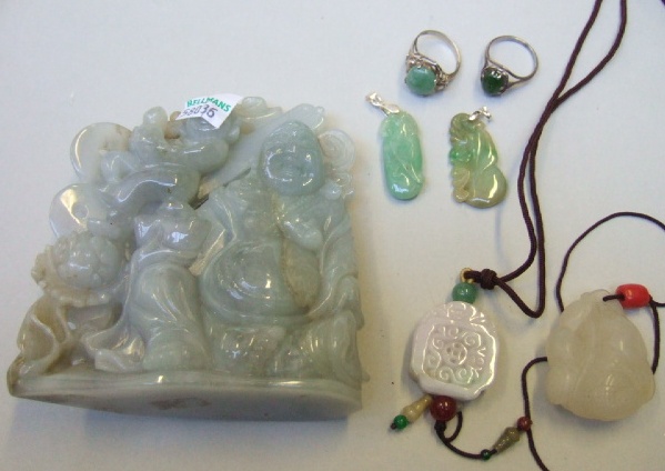 Appraisal: A jade carving in the form of a lotus leaf