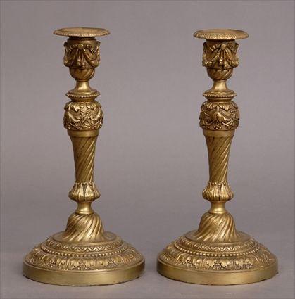 Appraisal: PAIR OF LOUIS XVI-STYLE GILT-METAL CANDLESTICK LAMPS Philip Lamp Co