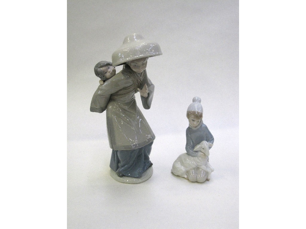 Appraisal: Two Lladro figures to include a Chinese mother carrying her