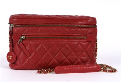 Appraisal: Red Chanel quilted leather purse With a zip-around top opening