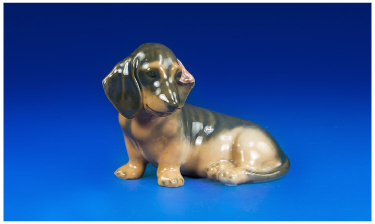 Appraisal: Royal Copenhagen Dachshund sitting marks to base cm