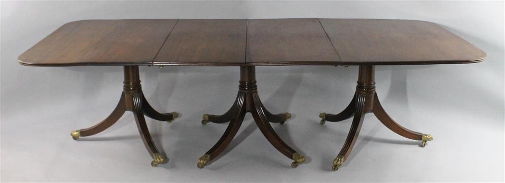 Appraisal: VINTAGE REGENCY STYLE MAHOGANY TRIPLE PEDESTAL DINING TABLE WITH TWO