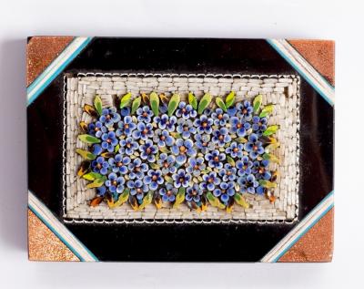 Appraisal: A micro mosaic paperweight decorated with forget-me-nots and gilded opalescent