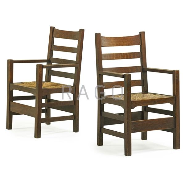 Appraisal: GUSTAV STICKLEY Pair of ladderback armchairs Condition Report Replaced rush