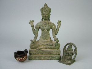 Appraisal: A Near Eastern cast iron figure of a four handed