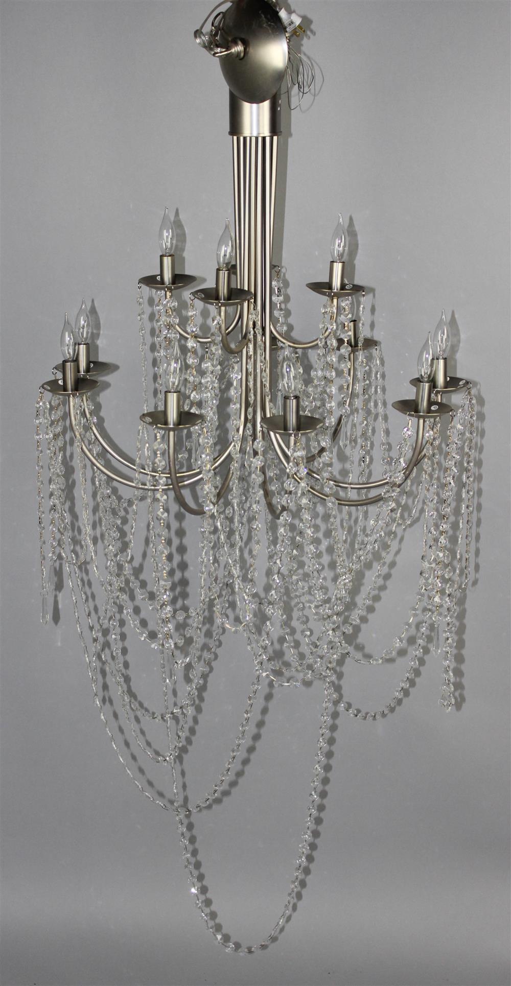 Appraisal: CONTEMPORARY MIRABELLE CHROME AND GLASS CHANDELIER faceted glass bead swags