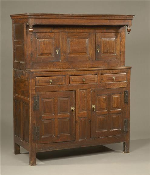 Appraisal: A George III oak press cupboard late th century the