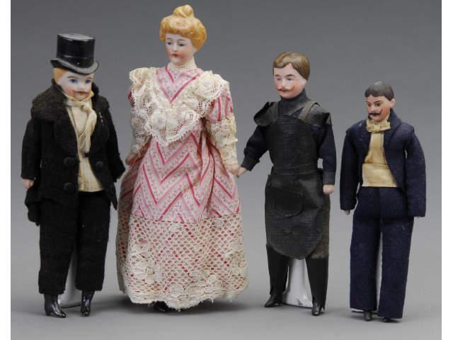 Appraisal: Four German Dollhouse Dolls MN Bisque heads and limbs Includes