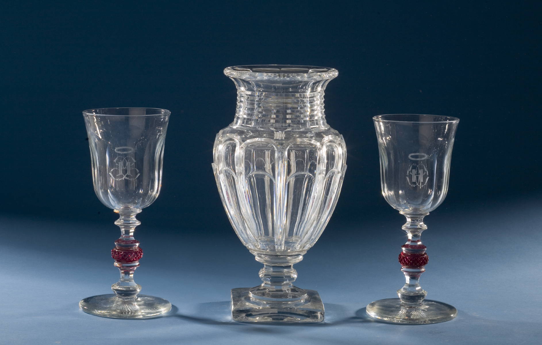 Appraisal: THREE EUROPEAN PANEL CUT GLASS TABLE OBJECTS INCLUDING A VASE