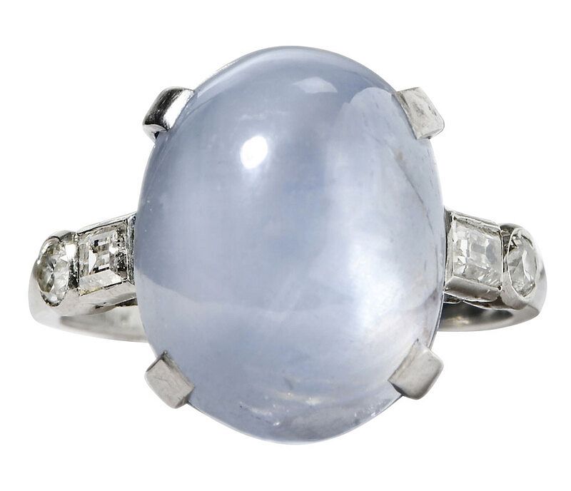 Appraisal: Platinum Sapphire and Diamond Ring one oval blue star sapphire