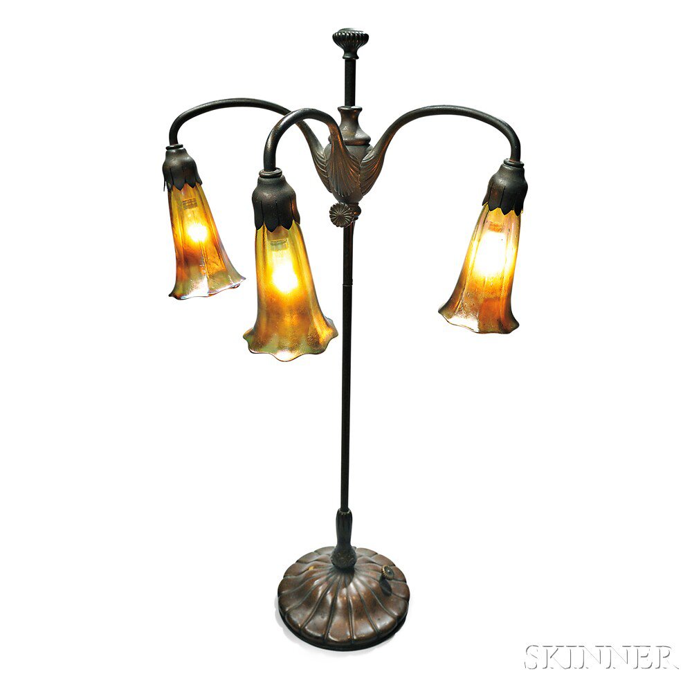 Appraisal: Tiffany Studios Lily Lamp Patinated bronze gold favrile glass New