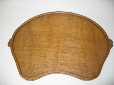 Appraisal: AN ADZED OAK TRAY by Robert Mouseman Thompson of kidney