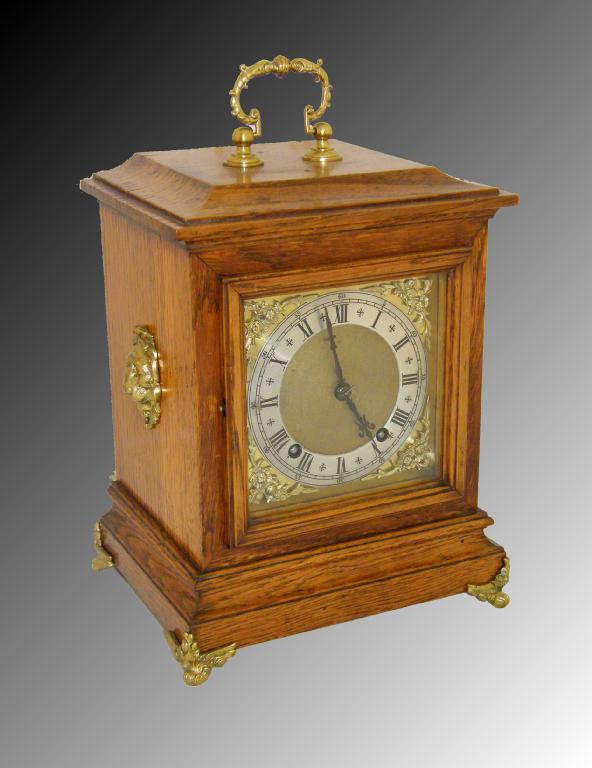 Appraisal: Small Georgian style oak two train bracket clock the square