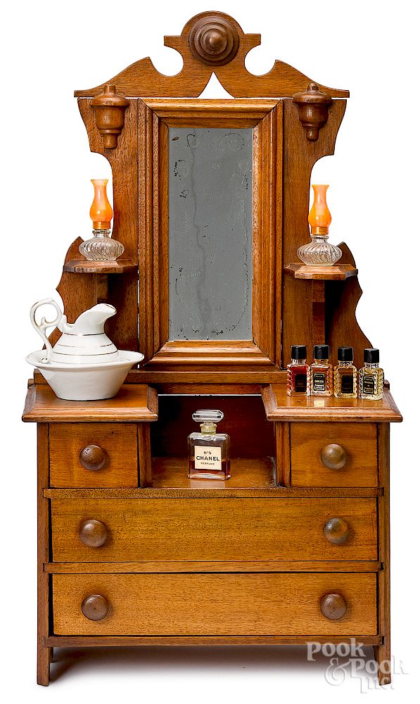 Appraisal: Victorian walnut doll-size dresser Victorian walnut doll-size dresser with accessories