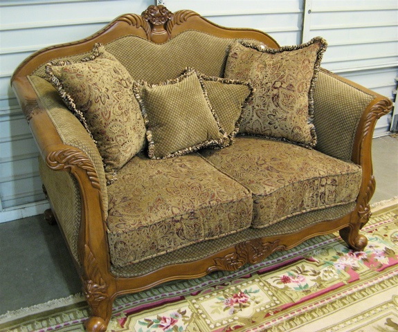 Appraisal: LOUIS XV STYLE LOVESEAT with carved and upholstered hardwood frame