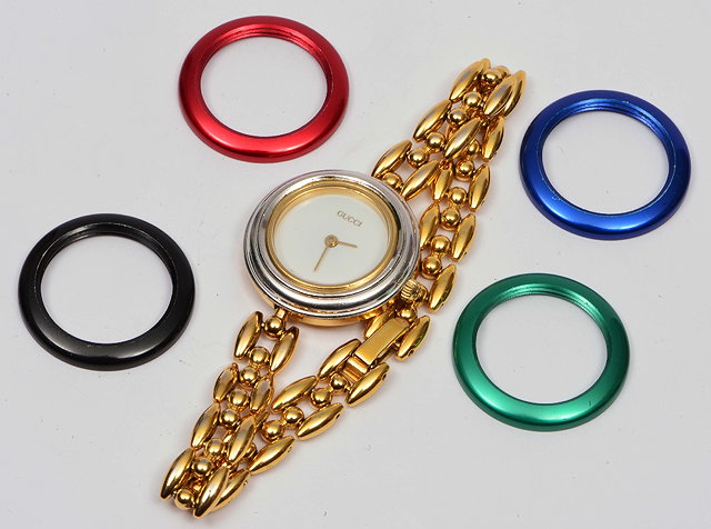 Appraisal: Gucci ladies wrist watcharticulated strap together with four further coloured