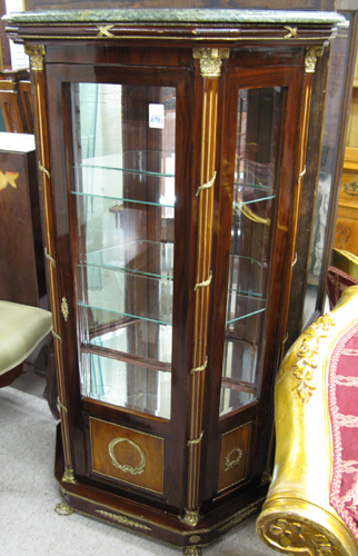 Appraisal: NAPOLEON III STYLE MARBLE-TOPPED AND ORMOLU-MOUNTED MAHOGANY VITRINE with full-length