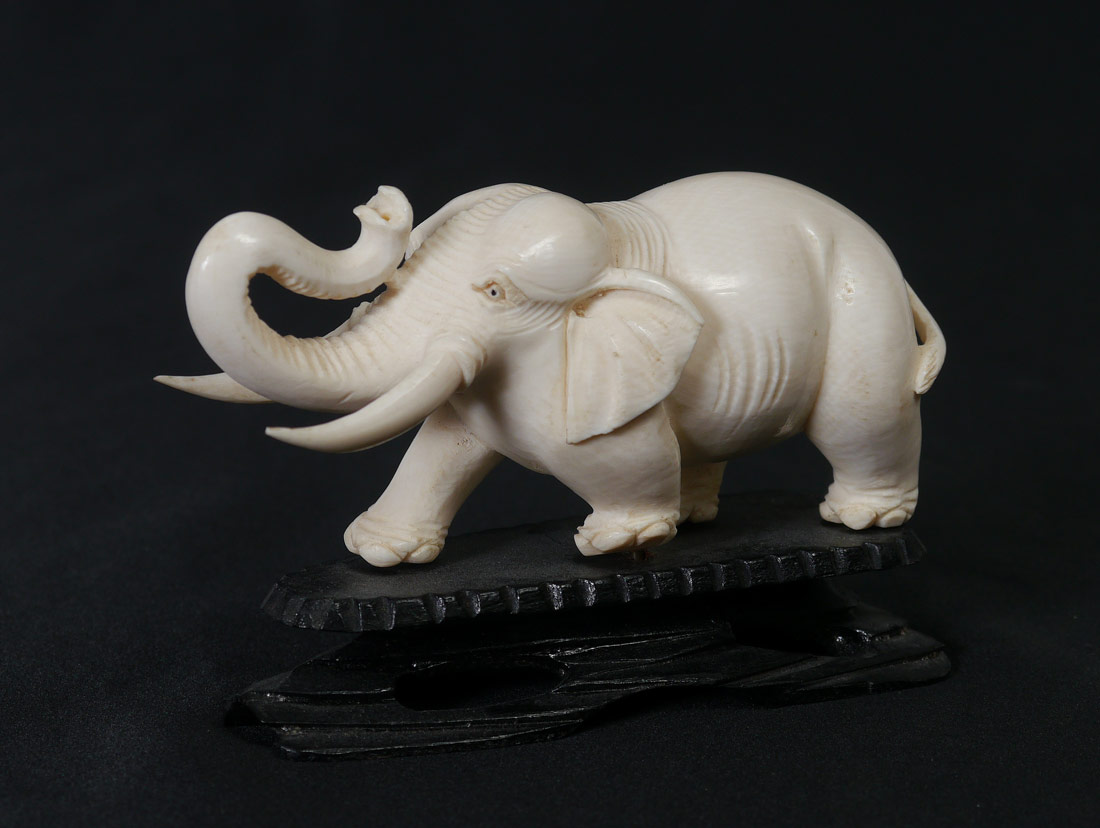 Appraisal: CARVED IVORY ELEPHANT Elephant measures '' h x '' on