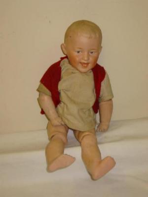 Appraisal: A Gebruder Heubach bisque head character doll with intaglio eyes