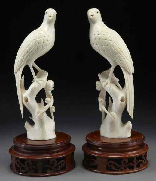 Appraisal: Pr Chinese carved ivory birds International buyers should note that