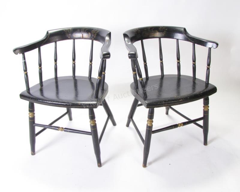 Appraisal: A pair of vintage Hitchcock-style captains chairs black with gold