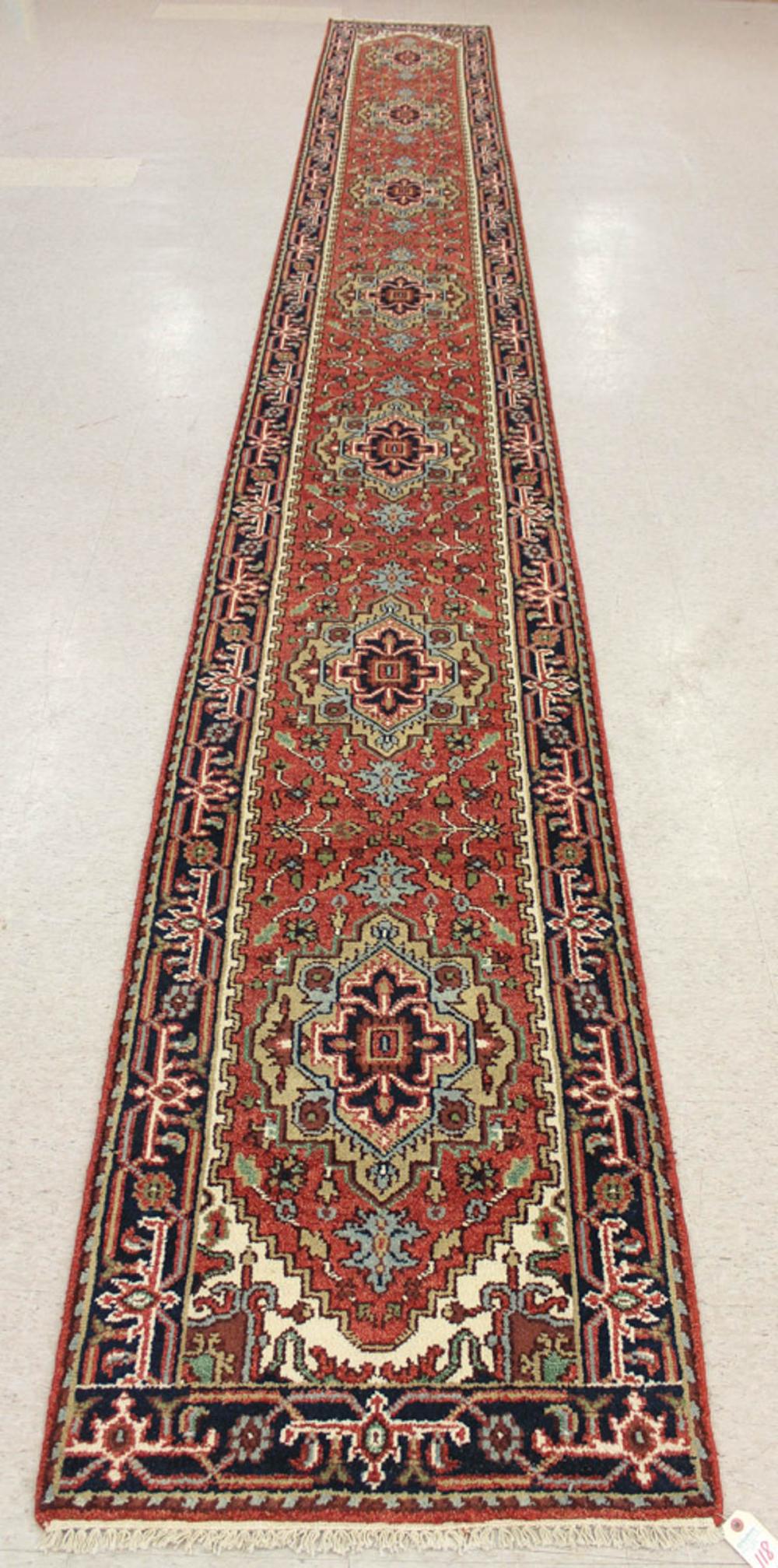 Appraisal: HAND KNOTTED ORIENTAL LONG RUG Persian Serab design on salmon