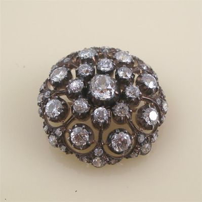 Appraisal: A late Victorian diamond set openwork circular brooch centred with