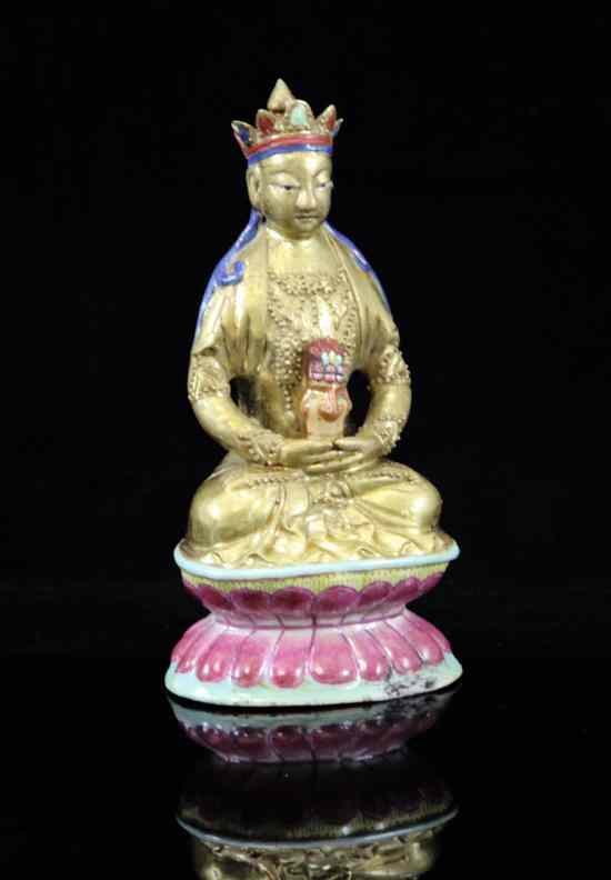 Appraisal: A Chinese famille rose seated figure of a Bodhisattva the