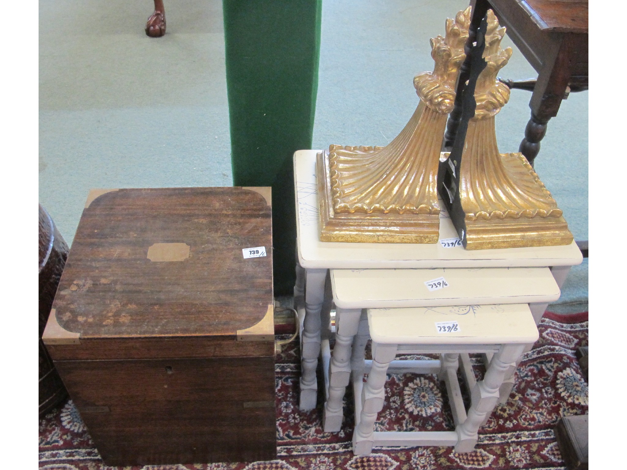 Appraisal: A wooden brass cornered decanter box nest of three tables