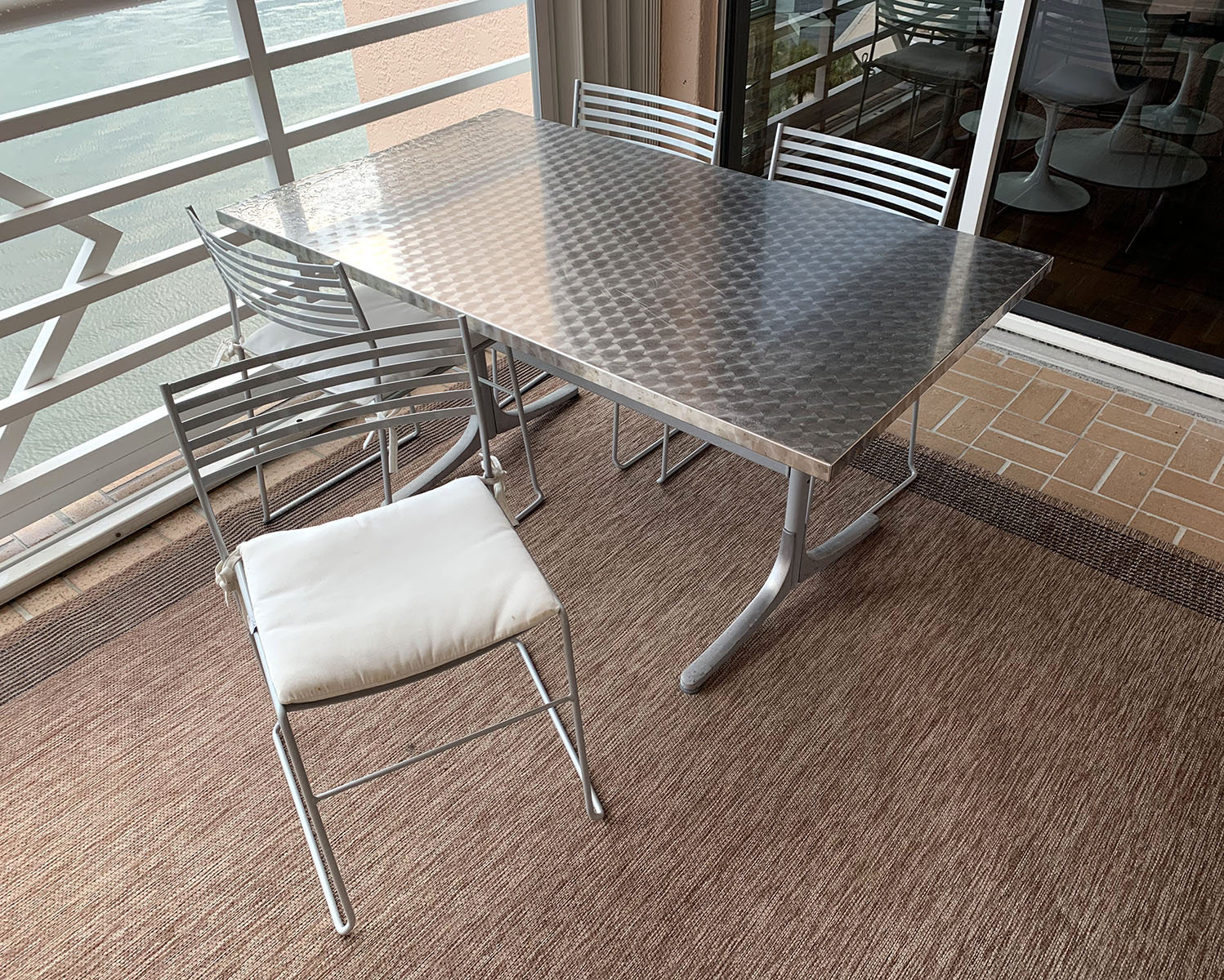 Appraisal: INNOX RECTANGULAR TABLE WITH AERO ALUMINUM CHAIRS Innox aluminum rectangular