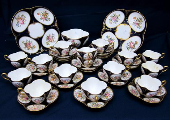 Appraisal: th century French porcelain part tea service comprising two cake