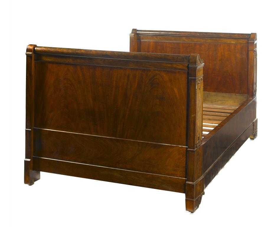 Appraisal: A LOUIS PHILIPPE MAHOGANY LIT EN BATTEAU with torus moulded