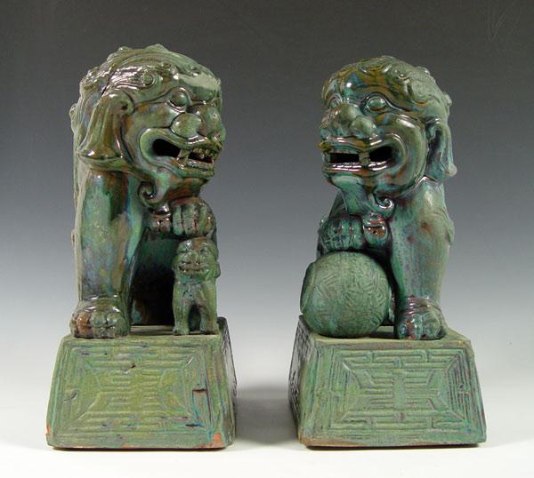 Appraisal: LARGE PAIR MALE AND FEMALE FOO DOGS Turquoise glaze ''